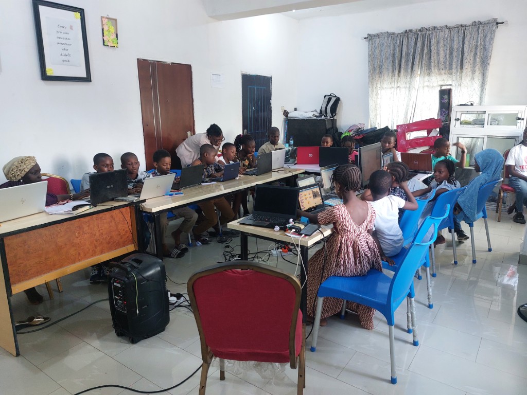 Students working on web development projects using HTML CSS JavaScript